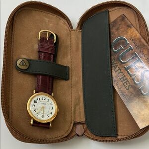 Vintage Guess Women's Watch with Gold Accents and a Burgundy Leather Band w/case